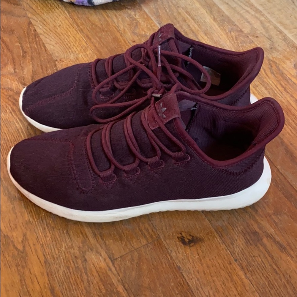 Burgundy adidas sneakers